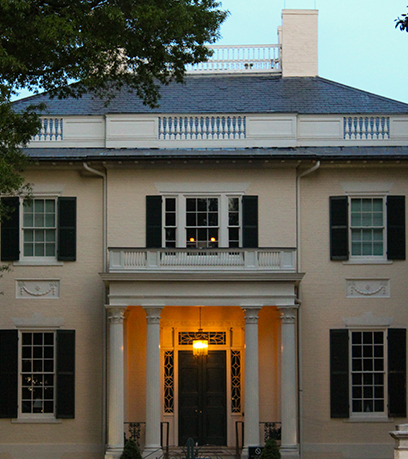 two lights shining in the top window of the Executive Mansion.