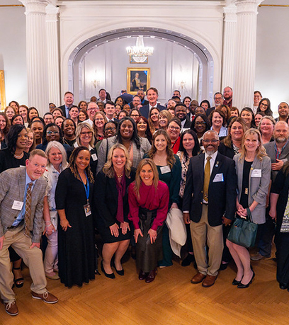 child welfare professionals with the Governor and First Lady